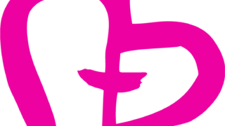 Pinkki sydän, jonka sisässä on risti.